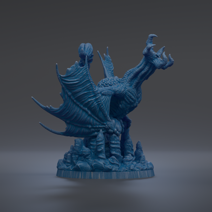 A 3D rendering of a blue dragon-like creature with large wings and sharp teeth, standing on a rocky base.