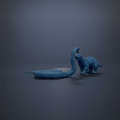 A blue toy animal, possibly a snake or a lizard, is shown in the image, with its head raised and appearing to be in a defensive or aggressive stance.