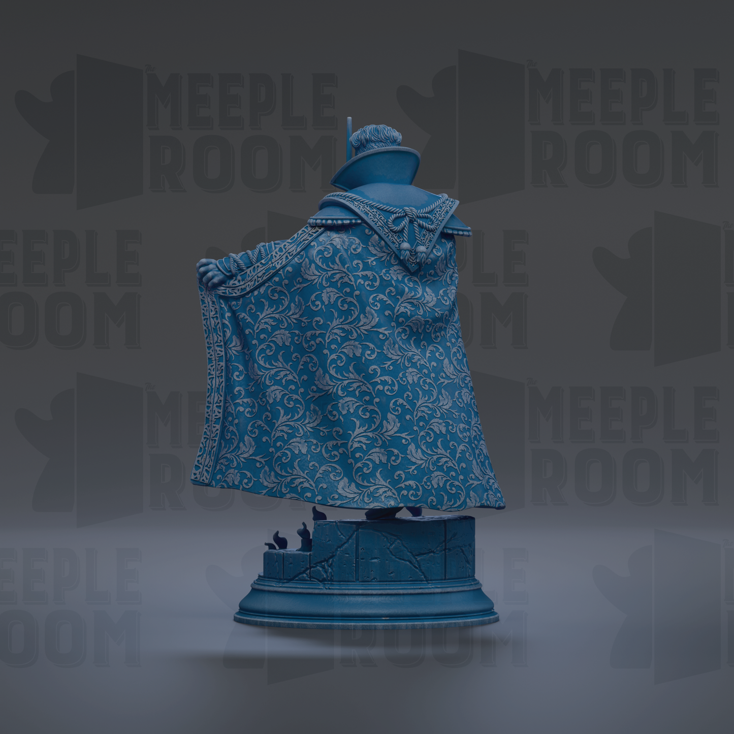 A statue of a person wearing a blue and white patterned cape, standing on a pedestal.