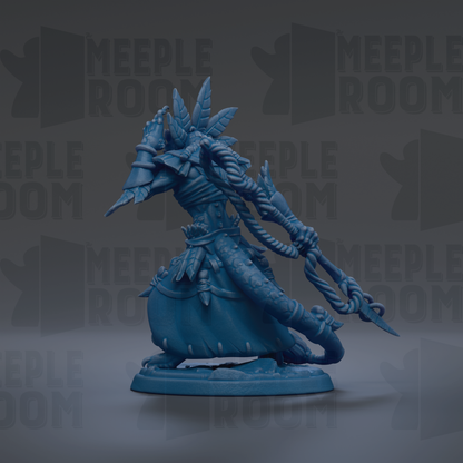 A blue figurine of a fantastical creature with intricate details and a flowing, ornate design.