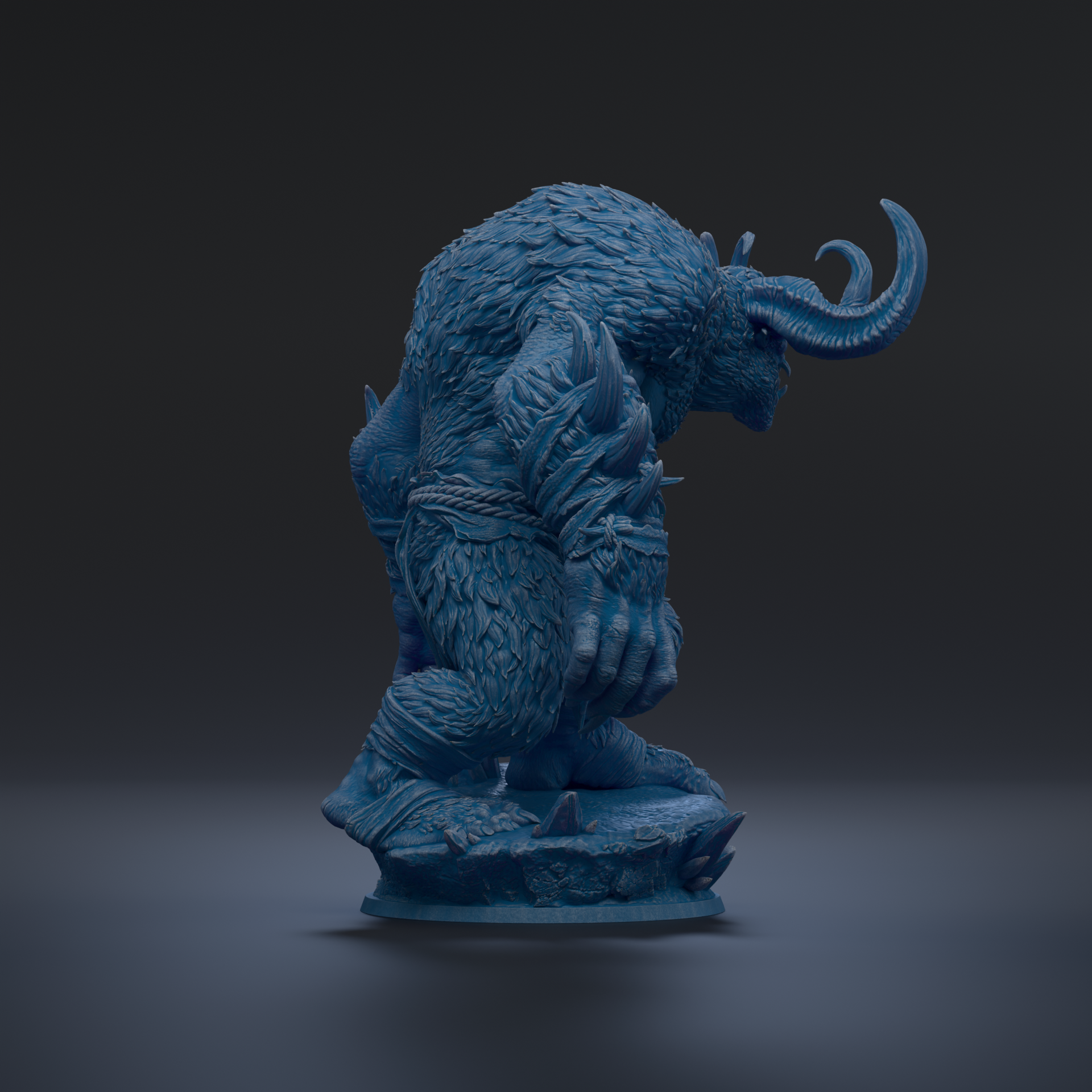 A blue, furry statue of a creature with horns and a fierce expression, standing on a rock.