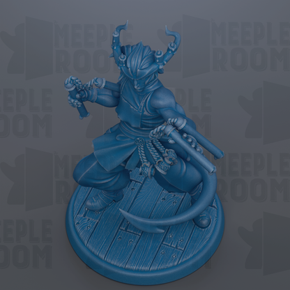 A blue figurine of a warrior figure with horns and a sword, standing on a wooden base.