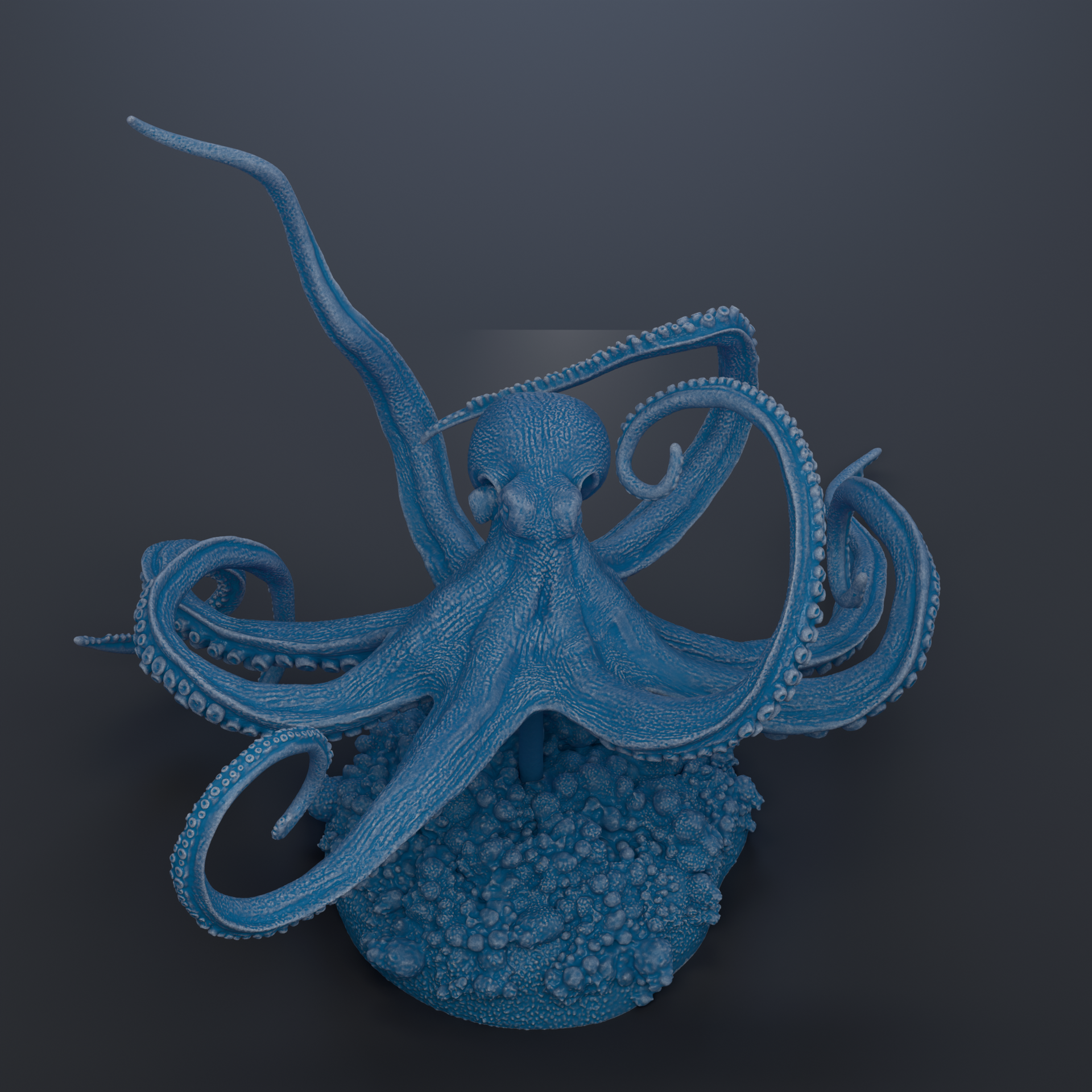A 3D rendering of a blue octopus with its tentacles spread out, appearing to be in a relaxed or resting position.