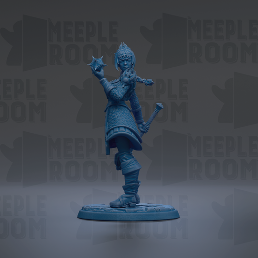 A blue figurine of a female character with a star-shaped object in her hand, standing on a base.