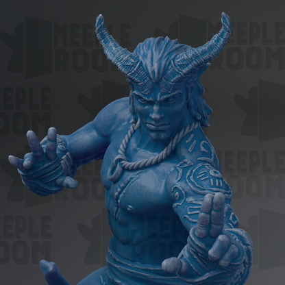 A close-up of a blue, horned statue with intricate designs on its body, appearing to be a warrior or deity figure.