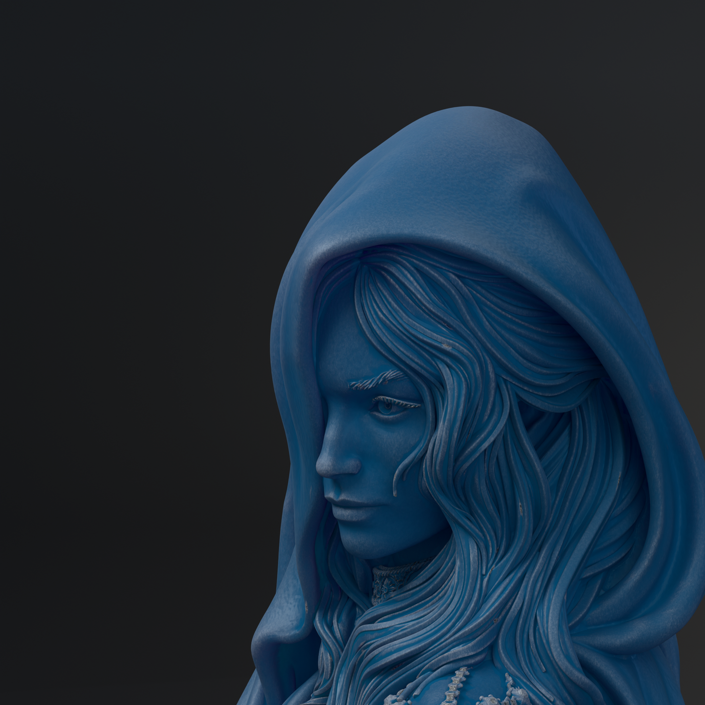 A close-up view of a blue, hooded statue depicting a woman's profile with flowing hair.