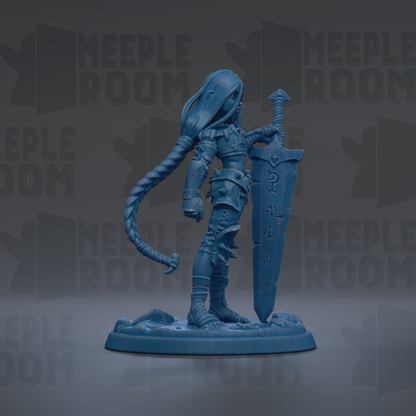 A blue figurine of a warrior standing on a base, holding a sword and shield.