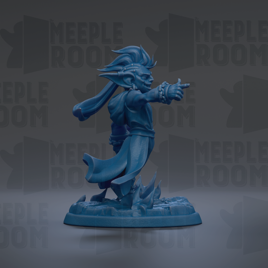 A blue figurine of a character with a flowing cape and a pointed hat, standing on a base and pointing with one hand.