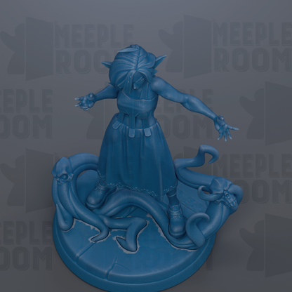 A blue figurine of a woman with a long dress and a headdress, standing on a platform with a snake and a dragon.