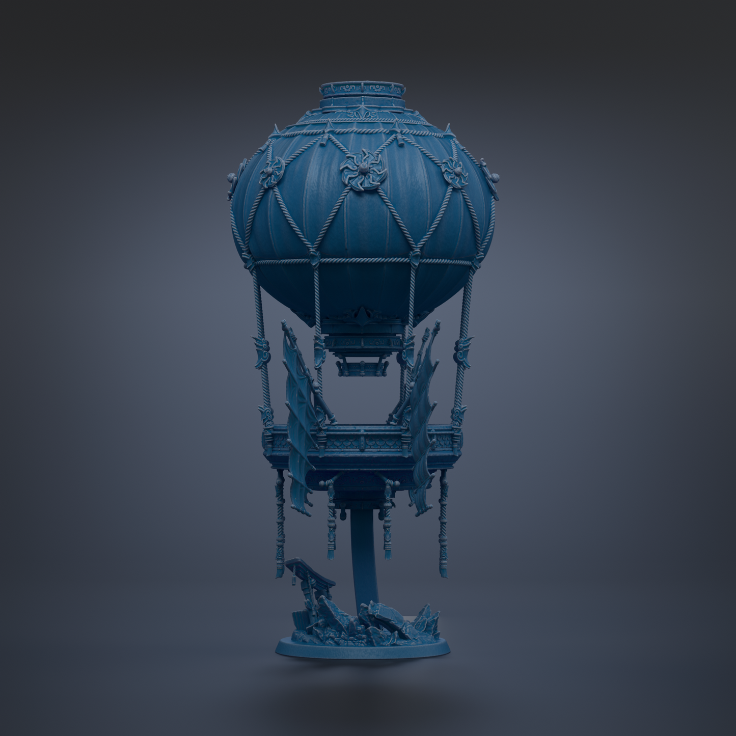 A blue, ornate hot air balloon sculpture stands against a dark background.