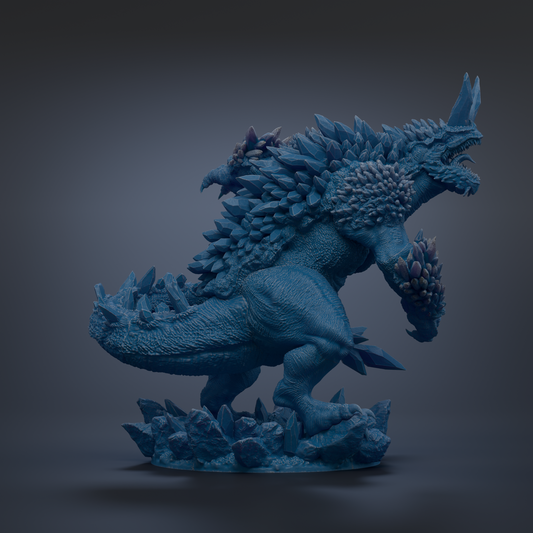 A detailed 3D model of a blue, fantastical creature with sharp teeth and spikes, standing on a rocky base.