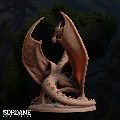 a statue of a dragon with its mouth open