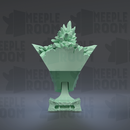 A green, 3D-rendered trophy or award with a pointed top and a base, set against a dark background with repeated text.