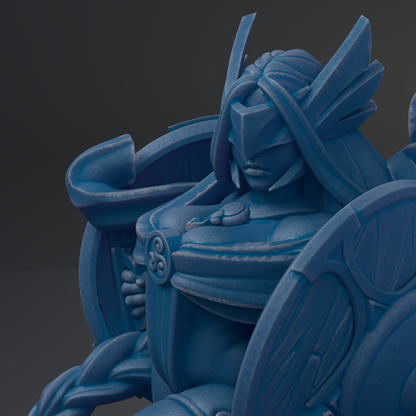 A close-up view of a blue, sculpted figure with a detailed, intricate design.