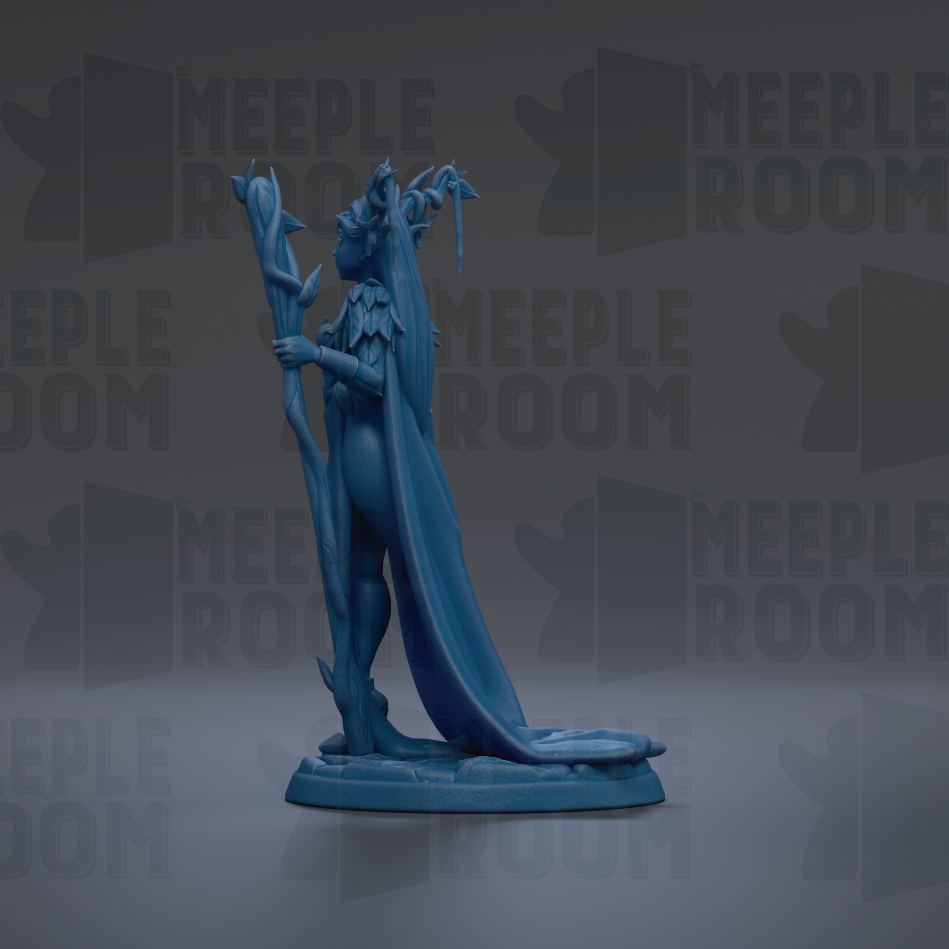 A blue figurine of a winged, winged creature with a long tail, standing on a base and holding a staff.