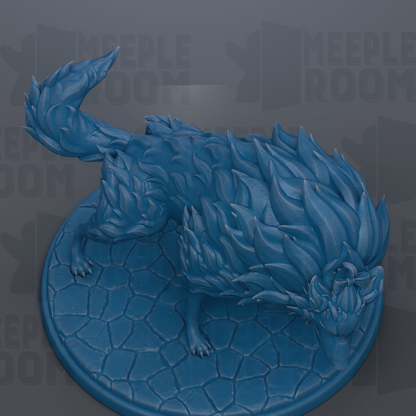 A blue, stylized sculpture of a wolf-like creature with a flowing, flame-like mane, standing on a textured, stone-like base.