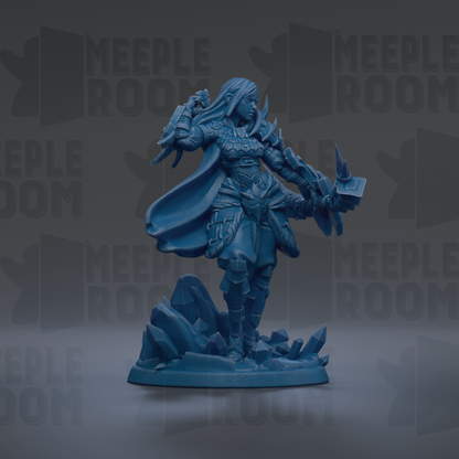 A blue figurine of a warrior standing on a rocky base, holding a shield and sword.