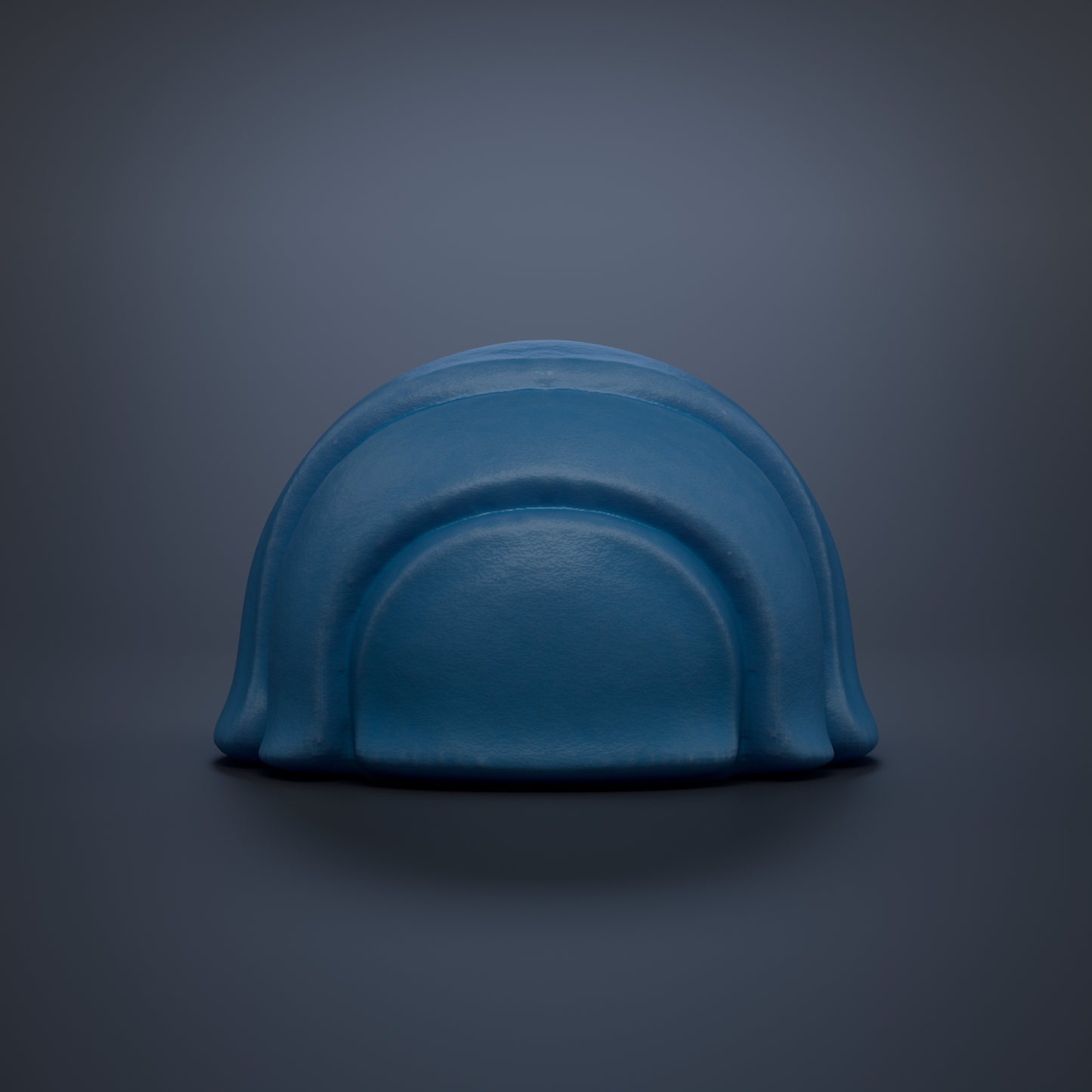 A blue, curved object resembling a helmet or hat is shown against a dark background.