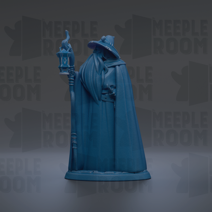 A blue statue of a wizard or magical figure holding a lantern and standing on a pedestal.