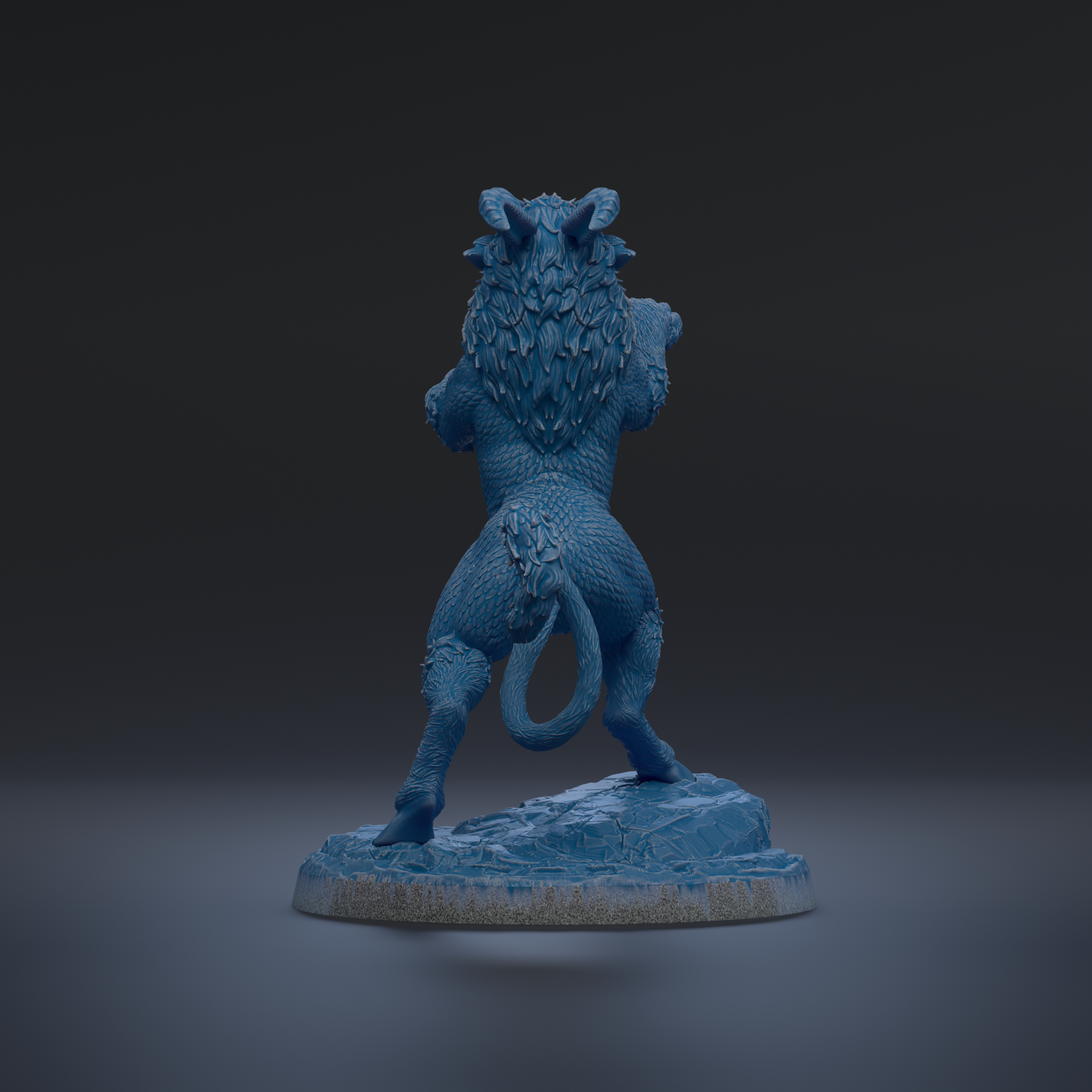 A blue, sculpted statue of a mythical creature with horns and a flowing mane stands on a rock against a dark background.