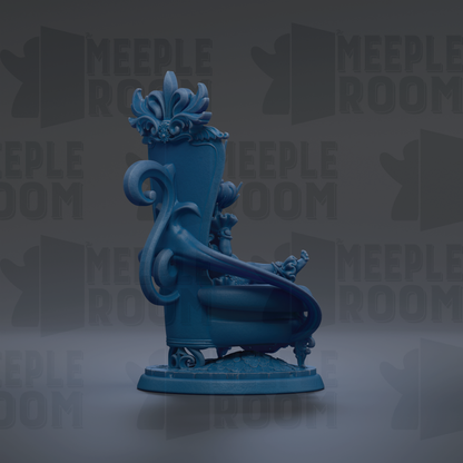 A blue, ornate chair with a decorative design, featuring a floral pattern and a figure seated on it.