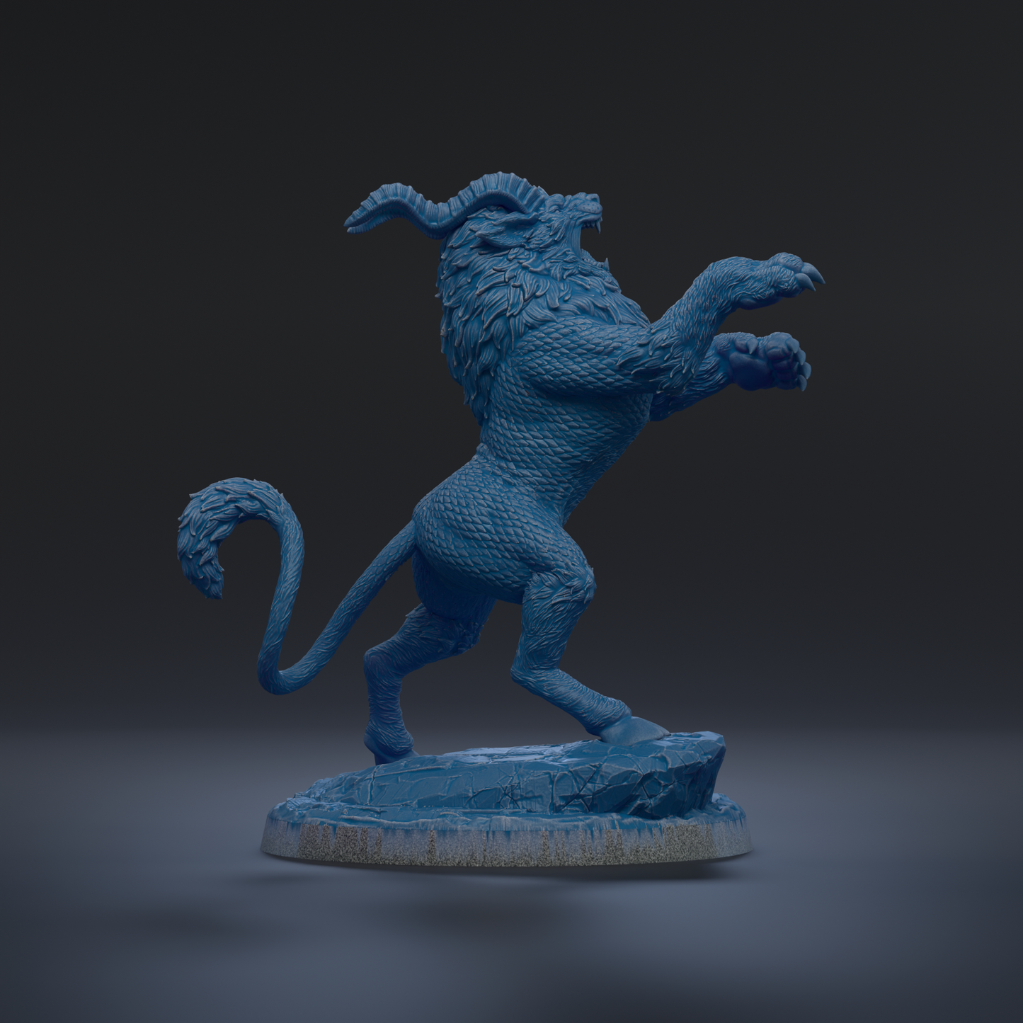 A blue, sculpted statue of a mythical creature with horns and a fierce expression, standing on a rock.