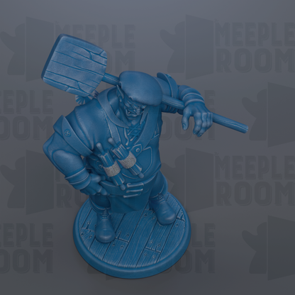 A blue figurine of a person holding a paddle and standing on a wooden base.