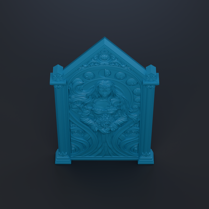 A blue, ornate, and intricately carved wooden structure with a central design featuring a woman's face surrounded by floral elements.