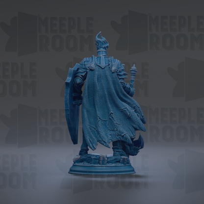 A blue statue of a knight holding a shield and sword, standing on a pedestal.