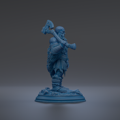 A blue figurine of a bearded man holding a large weapon, standing on a base.