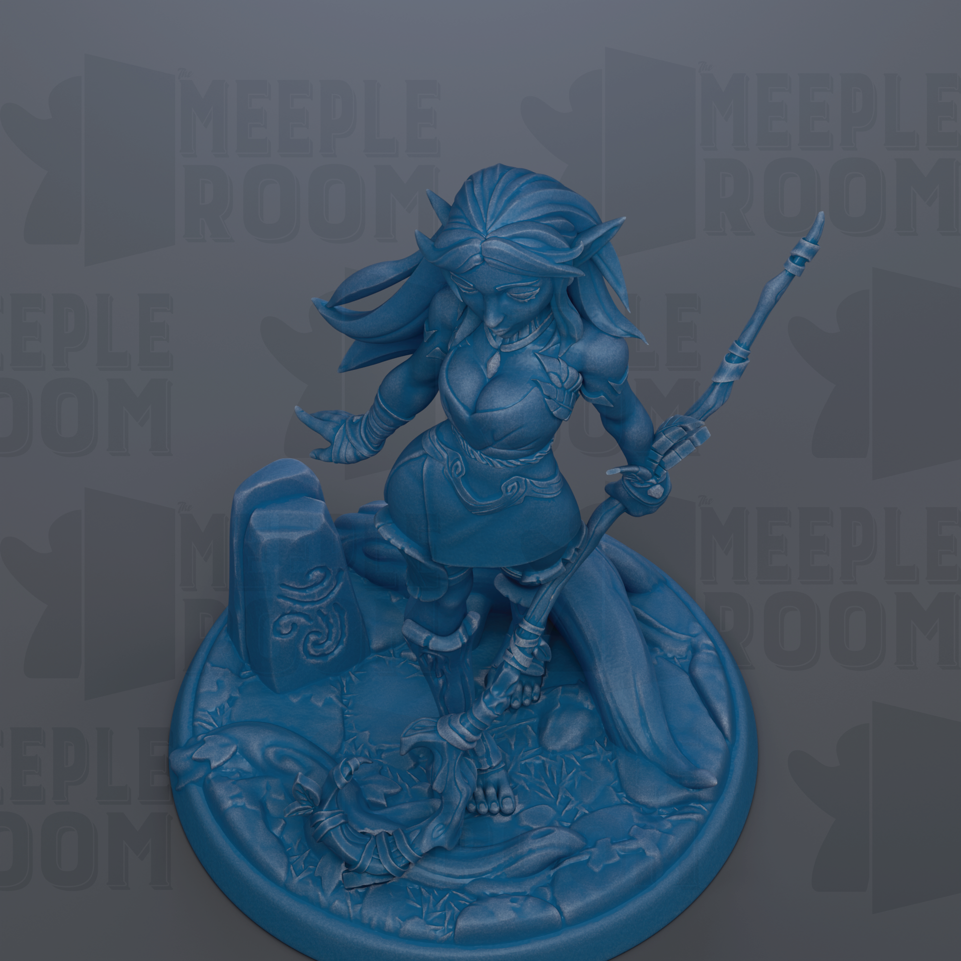 A blue figurine of a female character with long hair and a flowing skirt, holding a staff and standing on a rocky surface.