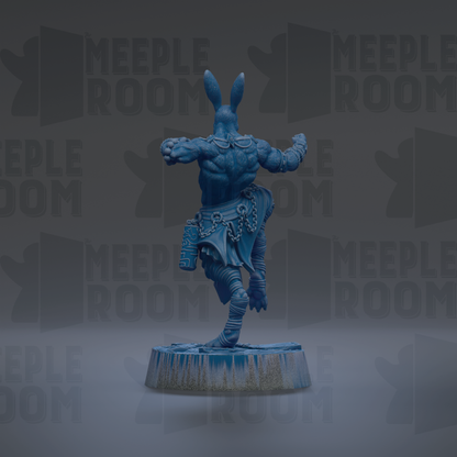 A blue, muscular figurine of a human-like creature with horns and a tail, standing on a platform and facing away from the camera.