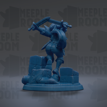 A blue figurine of a warrior standing on a pedestal, holding a sword in one hand and a shield in the other.