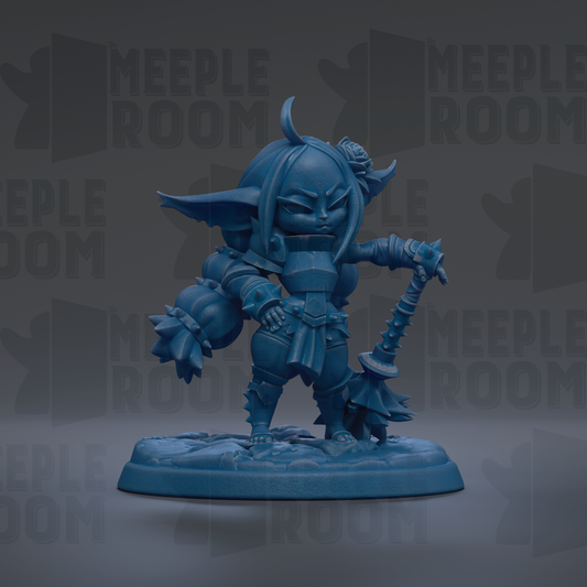 A blue figurine of a character with horns and a sword, standing on a base.