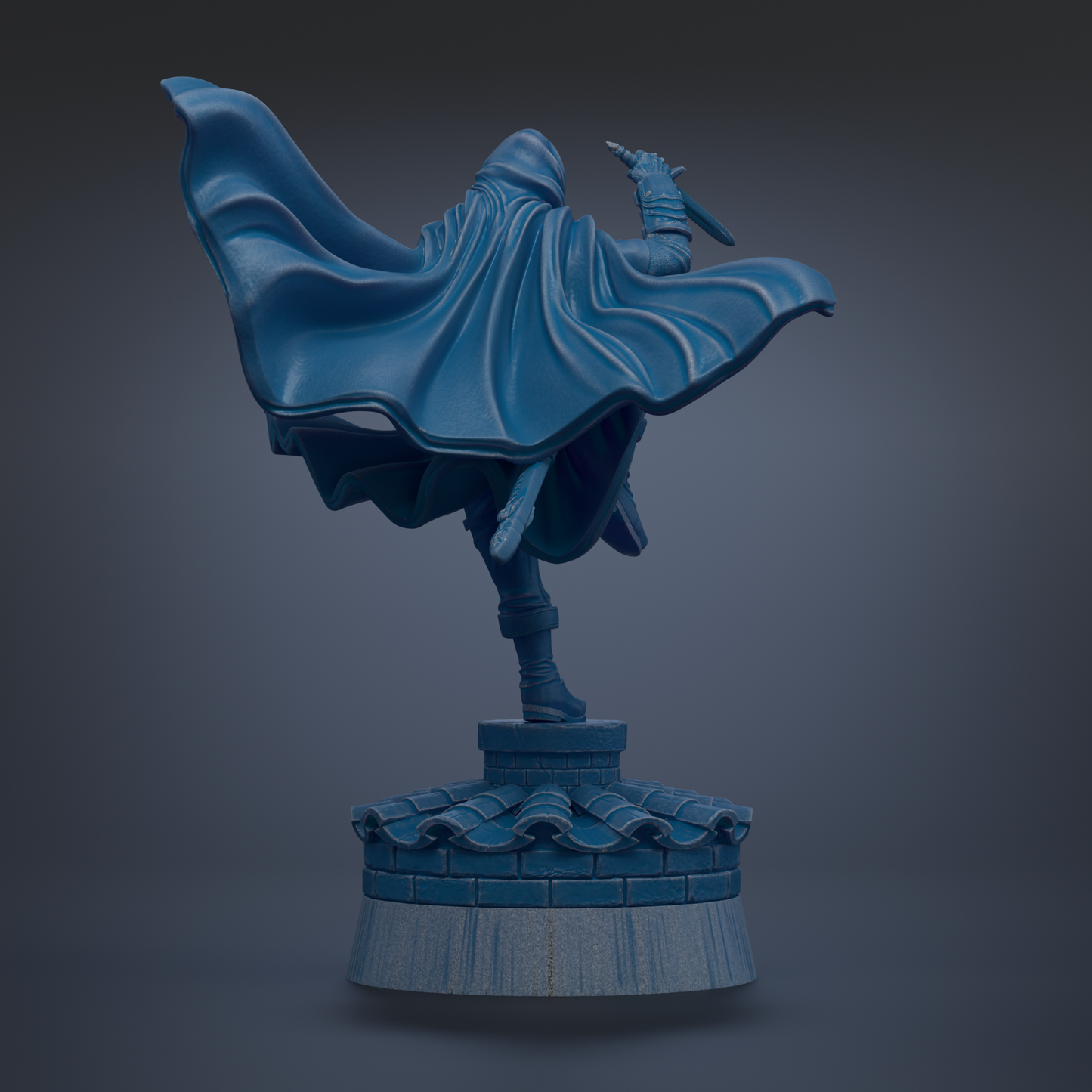 A blue statue of a person in a flowing cape, holding a sword, standing on a pedestal.