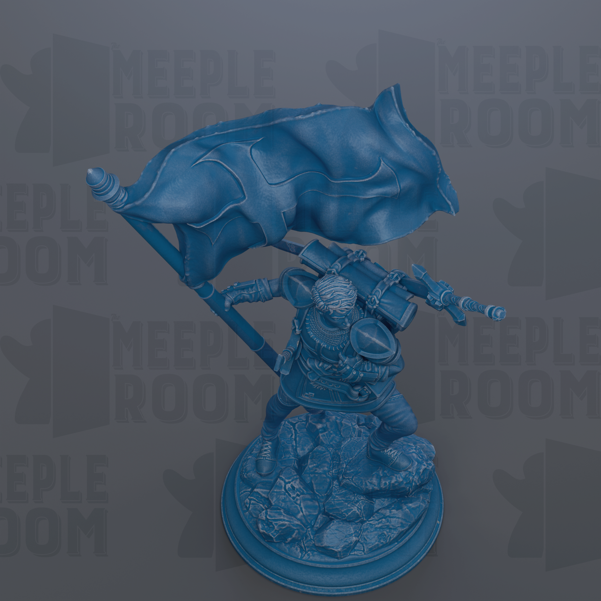 A blue statue of a person holding a flag, standing on a rocky base.