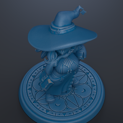A blue statue of a wizard or magical figure standing on a circular base with a geometric pattern.