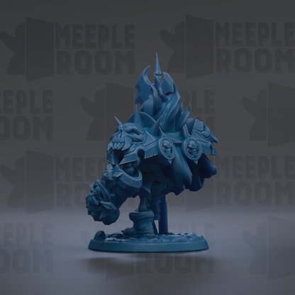 A blue, stylized figurine of a dragon-like creature with sharp teeth and claws, standing on a base.