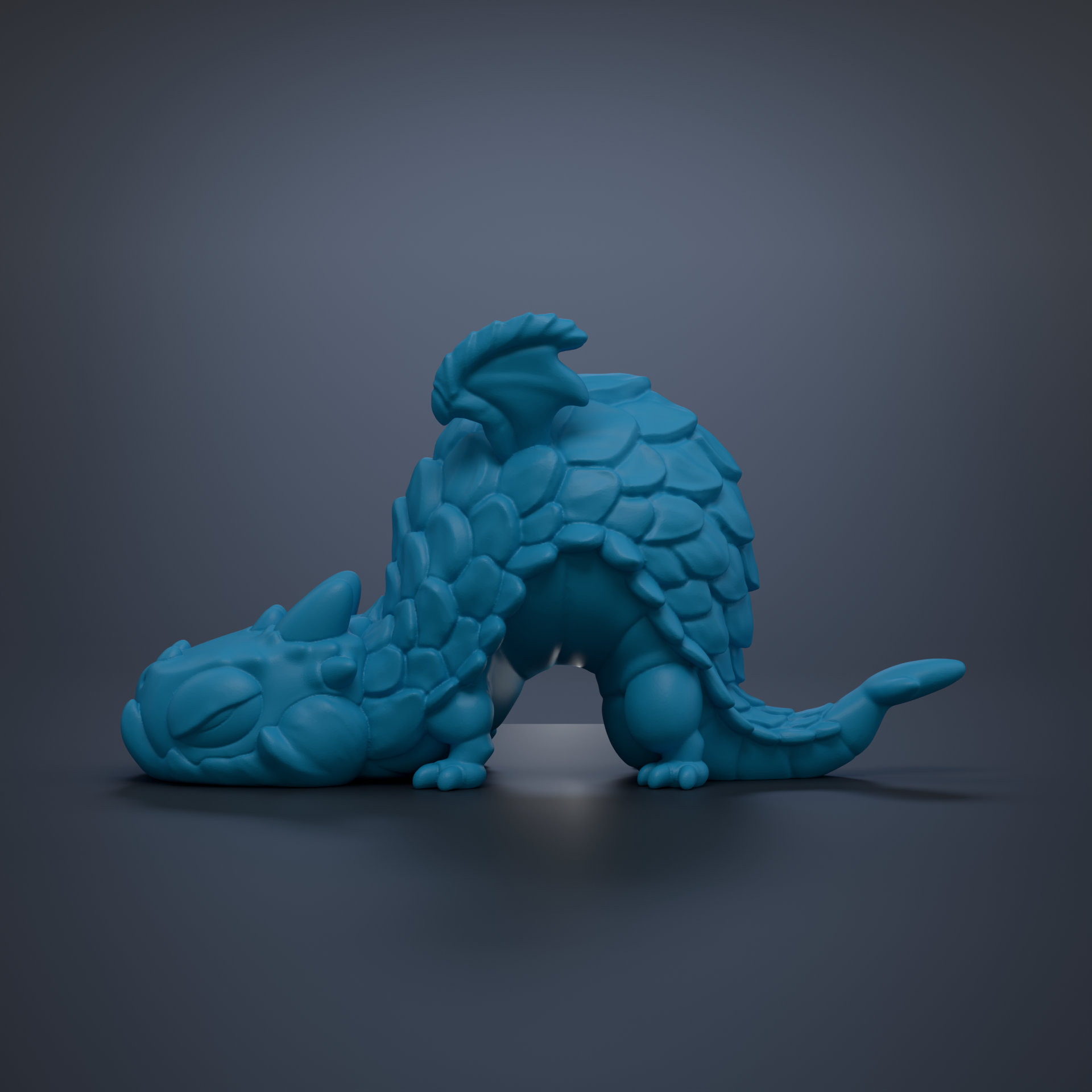 A blue, 3D-rendered dragon figurine is depicted in a resting position against a dark background.