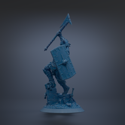 A blue, 3D-rendered statue of a warrior figure holding a shield and sword, standing on a base and facing to the right.