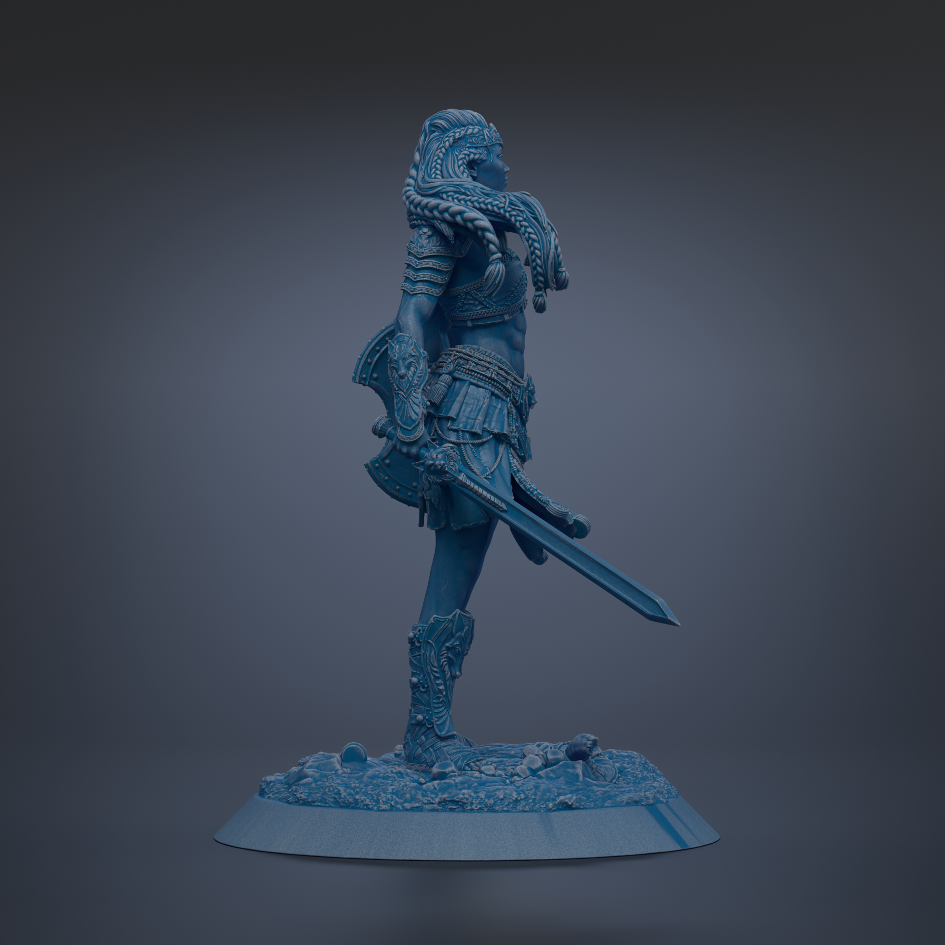 A blue statue of a female warrior standing on a base, holding a sword and wearing ornate armor.