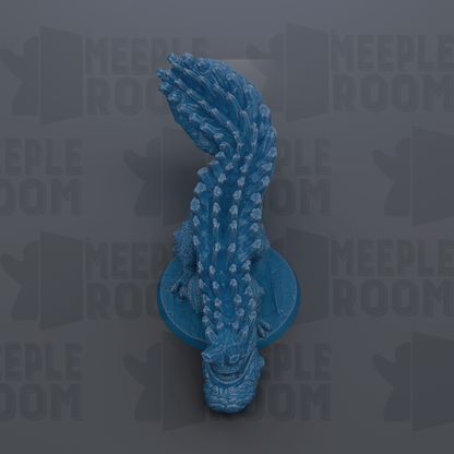 A blue, spiky figurine is displayed against a dark background with repeated text.