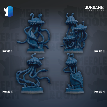 four blue, octopus-like figurines arranged in a grid-like pattern against a dark background.