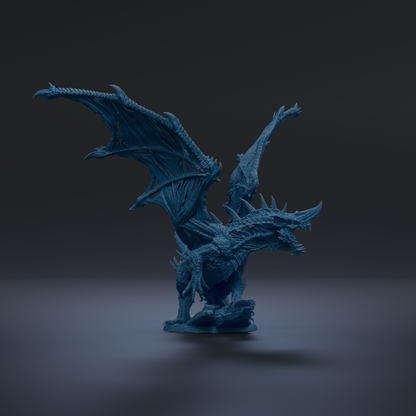 A 3D rendering of a blue dragon-like creature with sharp teeth and claws, standing on a dark surface.