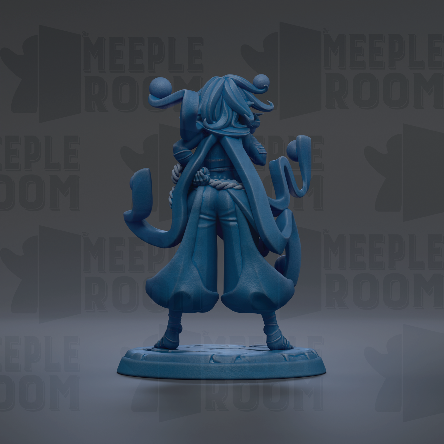 A blue figurine of a person with long hair and a flowing robe, standing on a base and facing away from the camera.