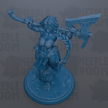 A blue figurine of a female warrior standing on a base, holding a large weapon in her right hand.