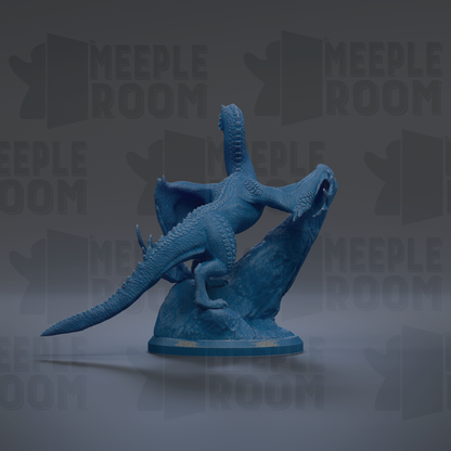A blue dragon figurine is depicted in a dynamic pose, with its wings spread wide and its tail curled around its body.