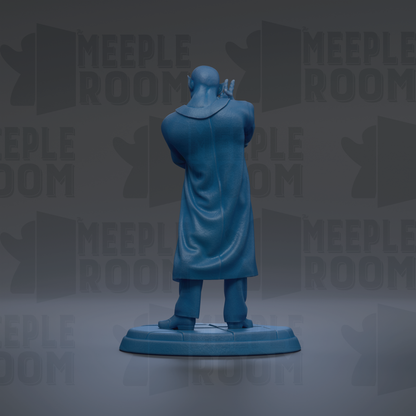 A blue statue of a person standing with their back to the viewer, wearing a long coat.