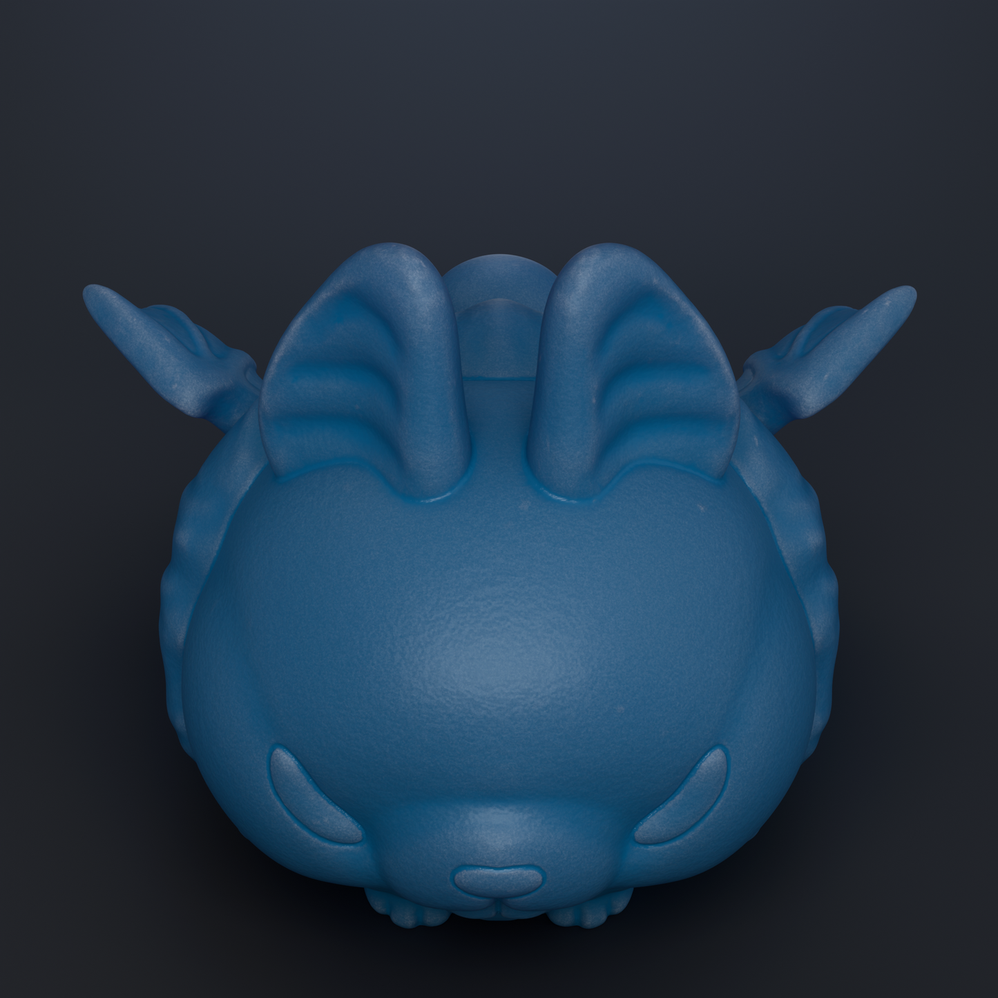 A blue, cartoon-like object with large ears and a round body, resembling a small animal or creature.
