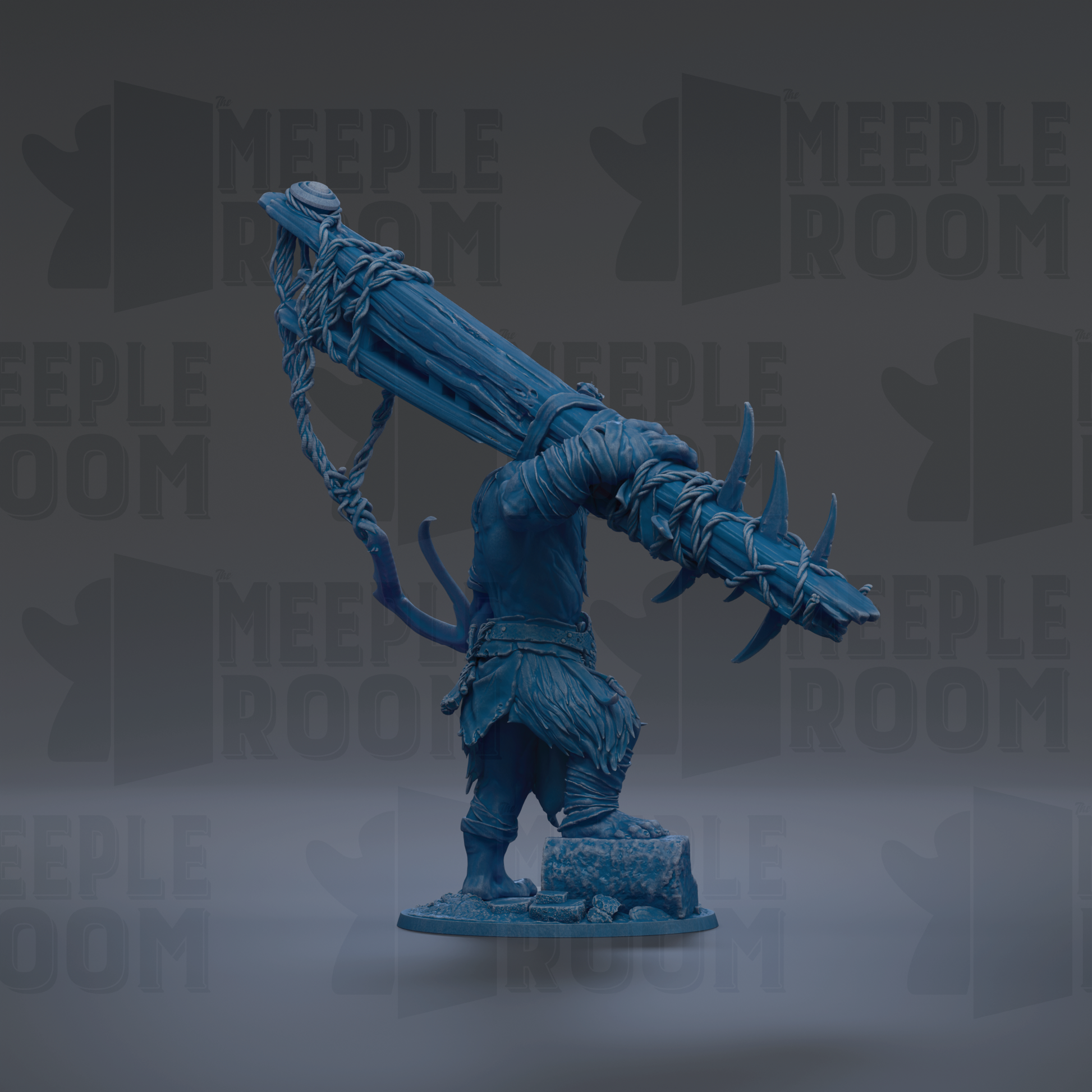 A blue figurine of a warrior-like figure with a large weapon, standing on a rock.